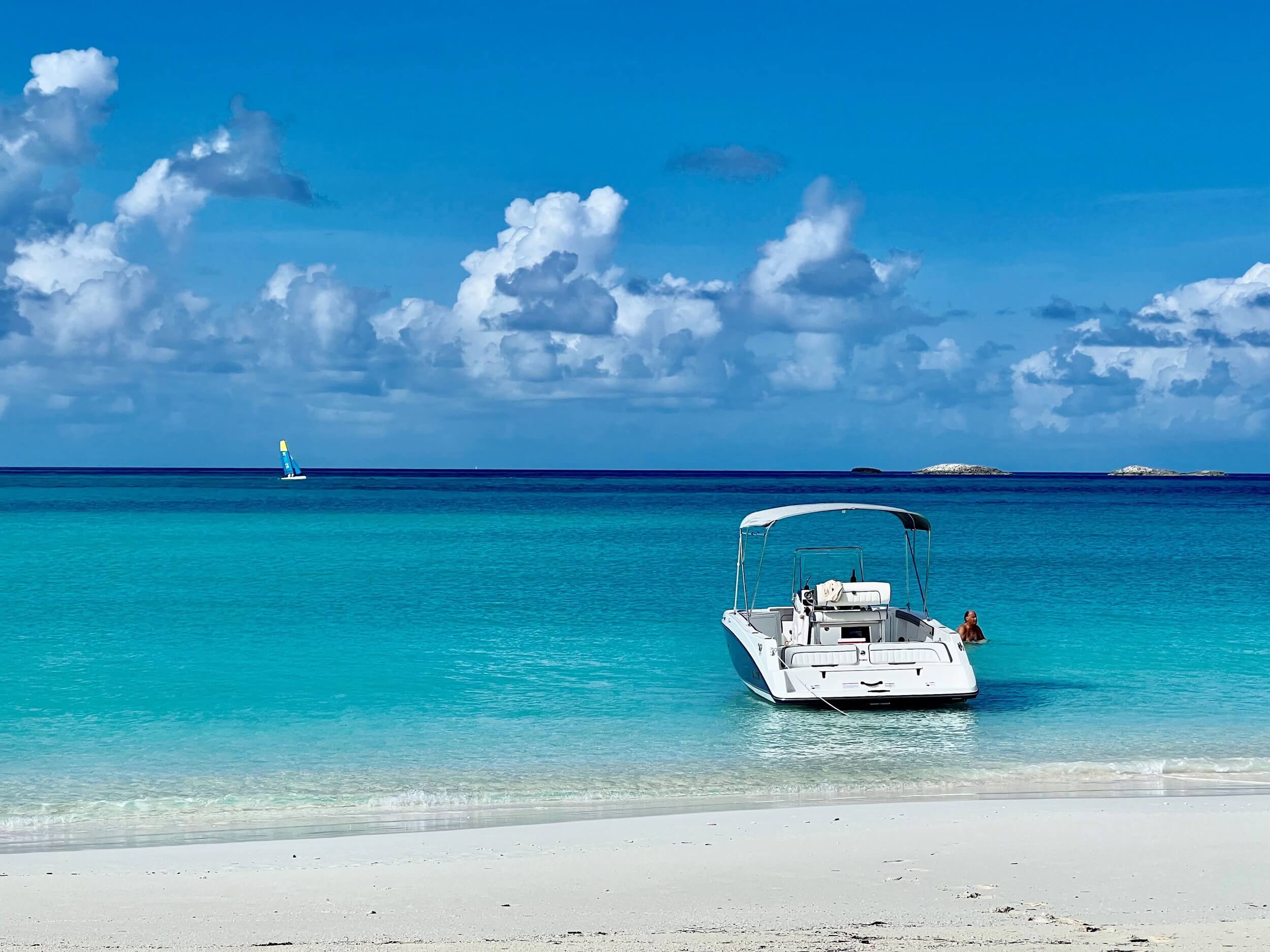 Boat ankered at beach Bakari House Great Exuma Bahamas
