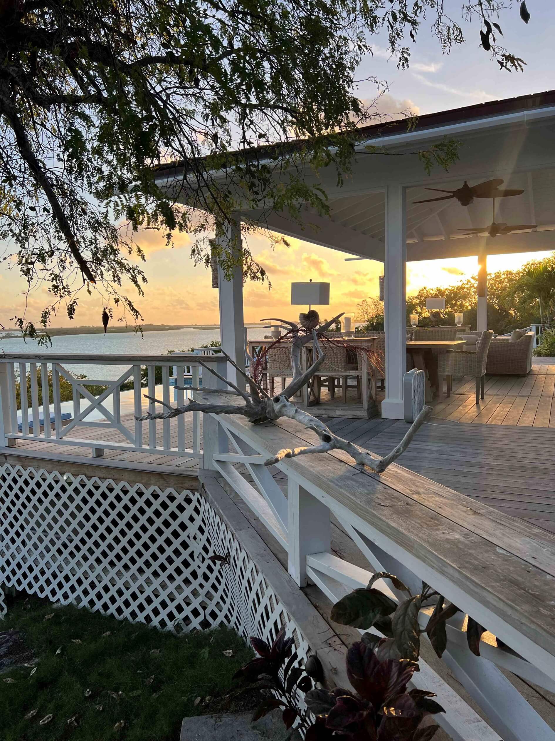 Outdoor terrace at sunset Bakari House Great Exuma Bahamas