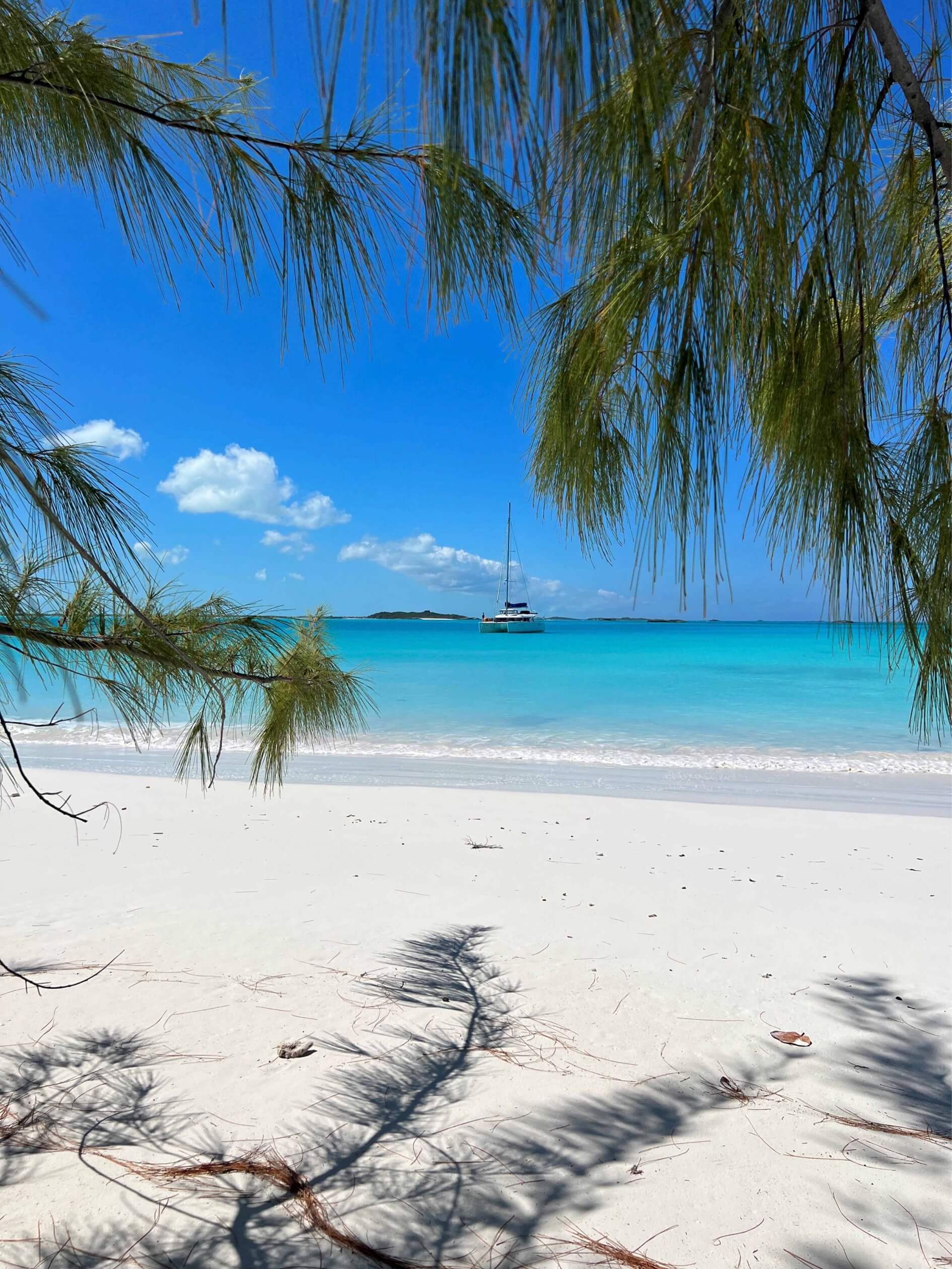 View of the white sand beach near Bakari House Great Exuma Bahamas
